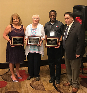 President Eddie Turner with the three recipients of the 2018 MCB Convention awards.